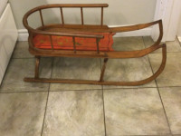 Early antique child’s sleigh with stencilling