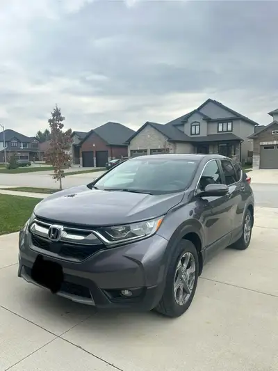 Selling my 2019 Honda CR-V EX in great condition. • Grey exterior with black interior • 210,000 km •...