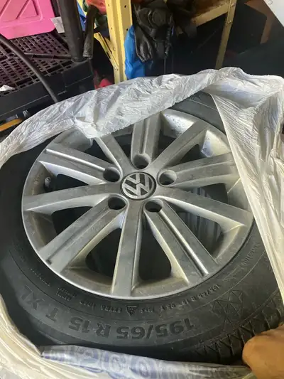 4 rims VW Jetta 2011 with winters maybe 1 season left on them with trunk and 4 matts
