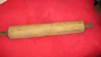 **Collectors Lovell solid rubber with 3/4 in. iron rod in the centre, 15 in. L x 2in. W.** $45. ** C...