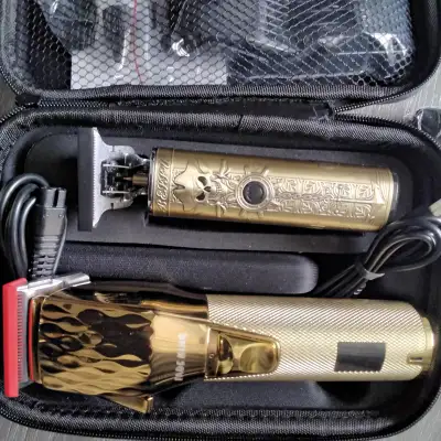 SELLING A NEW PROOFFESIONAL HAIR TRIMMER FOR HAIR SALONS COMES WITH TWO TRIMMER AND A GOLD FINNISH W...