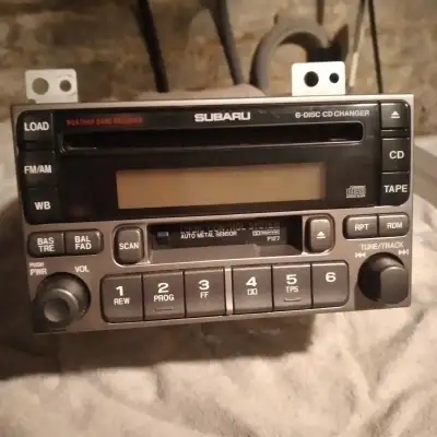 A 6 Disc CD Car Stereo with AM/FM Radio and Cassette Player for sale. Works great! Made by Matsushit...