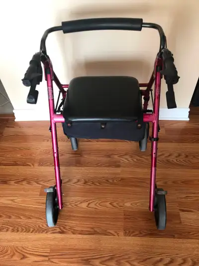 Hugo folding walker on 4 solid wheels. Comes with bag under the seat. Runs very smoothly. Breaks wor...