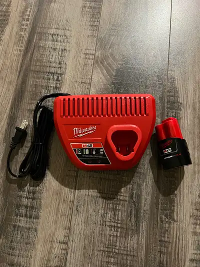 Milwaukee M12 battery + charger, View more