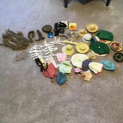 Doll hats, hairpieces, hangers, View more