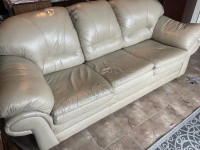 Leather Sofa - used and one side ripped