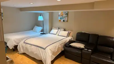 A large walkout basement room accommodating 3 people for rent.-Midtown Toronto(Yonge/ Eglinton Ave.)...