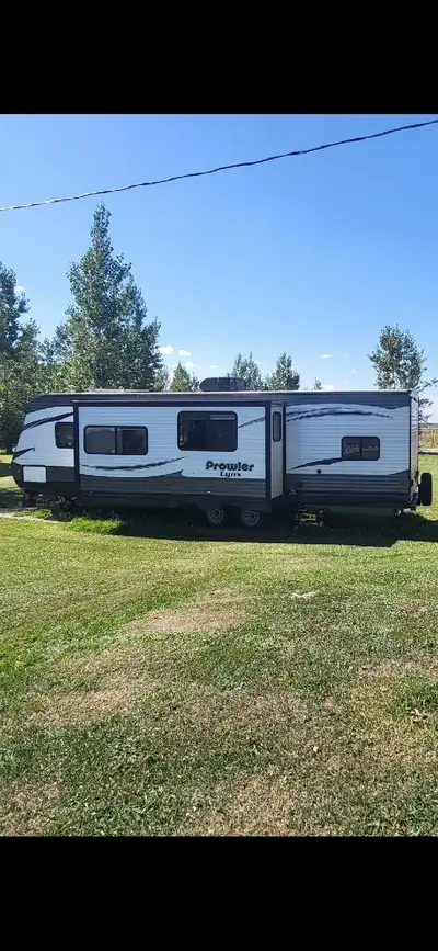 Private Sale......32ft Heartland Prowler Trailer,We Sold our Getaway Property so now Selling the Cam...
