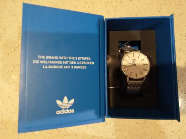 New Adidas watch 38 mm, silver-white with blue ring, 50M WR. in Jewellery & Watches in Oshawa / Durham Region - Image 10