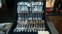 12 piece sterling silver plated, mint condition