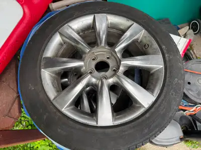 18-inch OEM alloy wheel from an Infiniti EX35 or QX50 (approx. 2008-2017), which is also compatible...