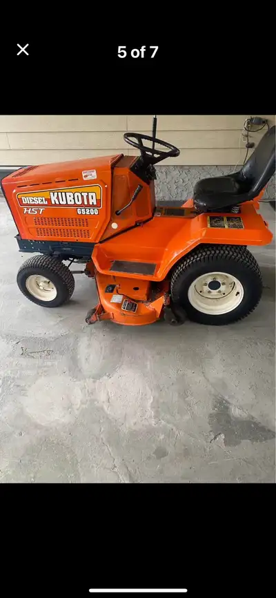 Kabota lawn tractor with three cylinder diesel engine 48 inch wide cut less than 250 hours runs grea...