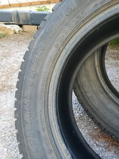 Dunlop Grandtrek SJ6. Minimal wear, no plugs. 2 tires.