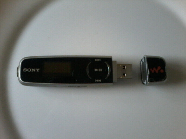 Sony MP3 player with headphones mint. Barely used. in Headphones in Cambridge - Image 2
