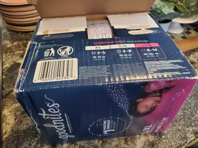 Box flap opened during move 34 count 2 sealed sleeves L/XL Pink Goodnites 60-125 lbs 8-14 suggested...