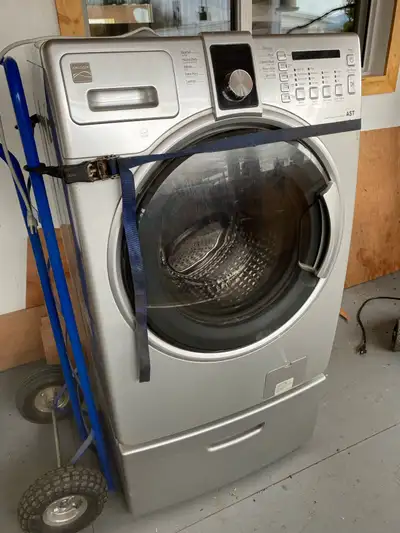 Newer Kenmore washing machine front load, works good, does vibrate. Scammers F… Off. I can deliver