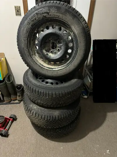 225/65R17 Continental Ice Contact XTRM Tires and 5 bolt rim combo. Only used for one winter, lots of...
