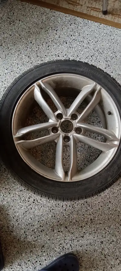 Set of OEM Audi A4 four alloy rims and tires, 17 inch. some tires have uneven wear but generally in...