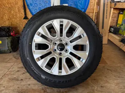 4 tires and rims - Not studded. Only used for one season. In good condition. I paid $3,500 for the s...