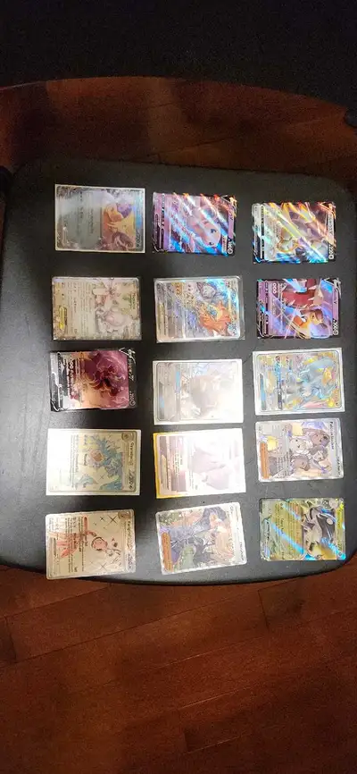 Some Pokemon cards. Not looking to sell right now. Trading for cameras (no digicams), Sony e mount l...