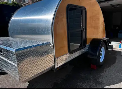 Awesome light weight (800lbs) tear drop trailer No damage no leaks. Everything works and is ready to...