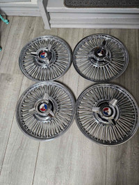NOS 14 INCH FORD HUBCAPS