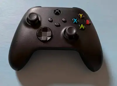 Selling my spare xbox controller. Only used a few times. Comes with charging cable. Works with xbox...