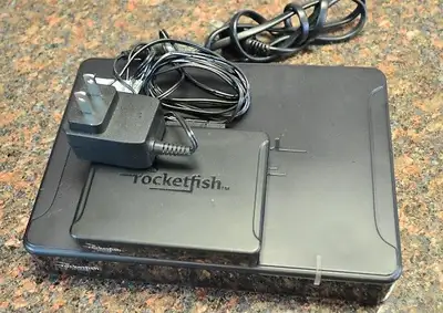 Rocketfish Universal Wireless Rear Speaker Kit RF-WHTIB Brand new in Box Includes: RF-WHTIB Sender R...