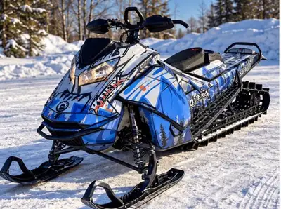 This 2022 Ski-Doo Summit is a powerful mountain snowmobile currently showing 5925 kilometers on the...
