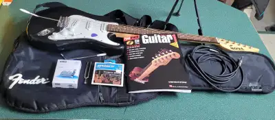 Nova guitar works great. Very nice shape. Has Fender soft case. Everything you need. Book, pic, Didi...