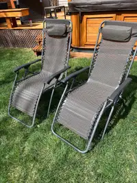 2 zero gravity lawn chairs 