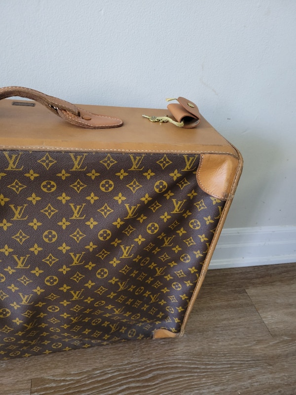 Vintage Louis Vuitton Canvas and Leather Travel SuitcaseThe lug Women