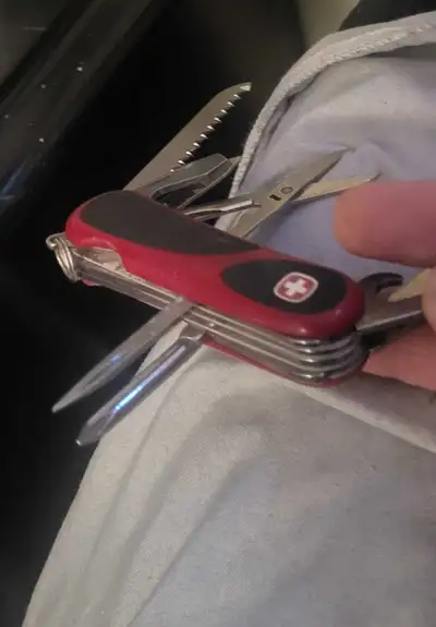 This Wenger multitool is a versatile companion for any adventure. It's in good condition and ready f...
