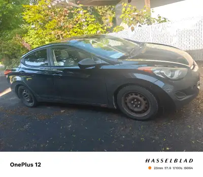 Selling my 2011 Hyundai Elantra with 199,000 km on the odometer. The car is in good running conditio...