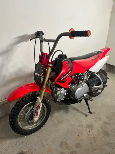 Honda crf 50 with gio 125cc motor Starts runs drives and stops Pro taper big bars red Barron triple...
