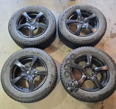 Set of 4 - 17" Wheels used for winter driving. Bridgestone Blizzak DM-V2. Tread depth currently 8/32...