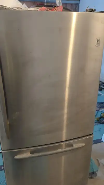 GE Profile Fridge and Stove Each $100, View more