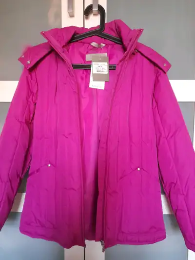 Selling New with tags on, Down feathers filled women's winter jacket size medium. Rabbit Fur trim ar...