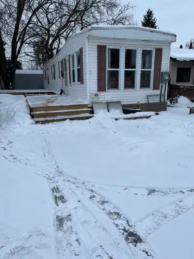 Located in Terra Nova Estates in Orleans. Please read complete ad. 2001 Northlander 12’X 53’ mobile...