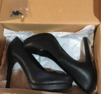 Woman’s size 6 black leather high heels brand new still in box