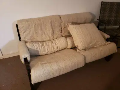 Ikea loveseat and matching chair. Has been recovered with matching pillows.