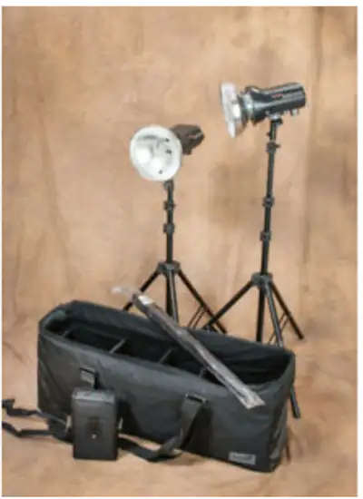 Hey! I have a rarely used Photogenic StudiomaxIII light set up WITH BATTERY PACK COMES WITH 2 strobe...