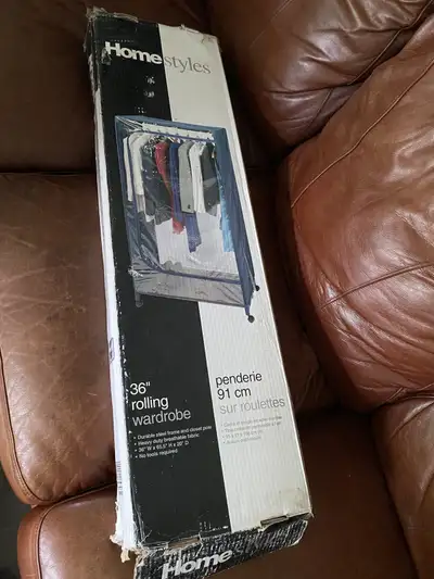 Standing external closet Plastic cover with metal frame Contents unused, box has been moved often Se...