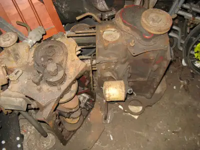 2 partly disassembled MGB engines