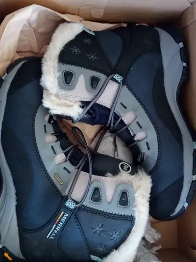 Brand New In Box. Blue and Black Merrell Winter Boots. 100% Waterproof. Will keep you warm this wint...
