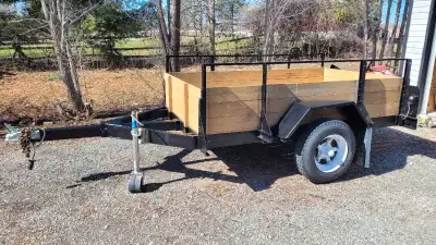 Very solid trailer with both ends that are removable. New tongue and jack. Ready for your 4 wheeler...