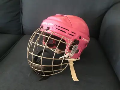 Small hockey helmet. Only used a few times. Like new.
