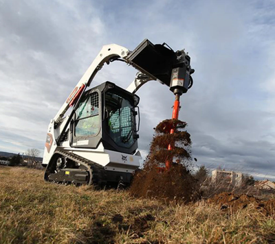 Offering Bobcat T450 track loader rental services with operator and fuel included. Perfect for gradi...