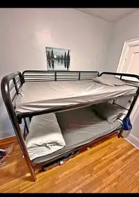 Single over single metal bunk bed available for sale