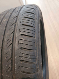 Four 215/55/R16 all season tires 